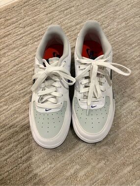 Nike Kids White Sneakers with Light Gray and Navy Accents